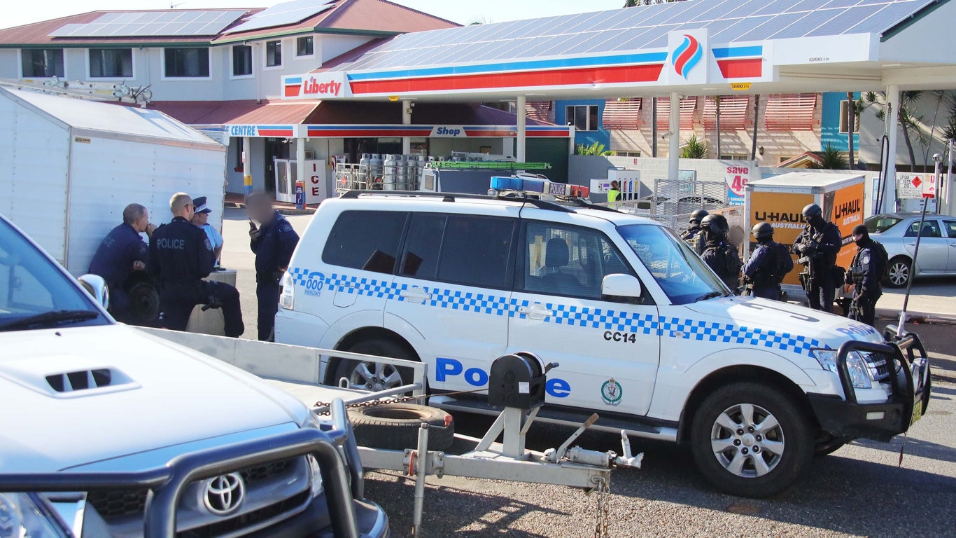 Heavily armed tactical police were involved in this morning's police operation at Sapphire Beach. Picture: Frank Redward