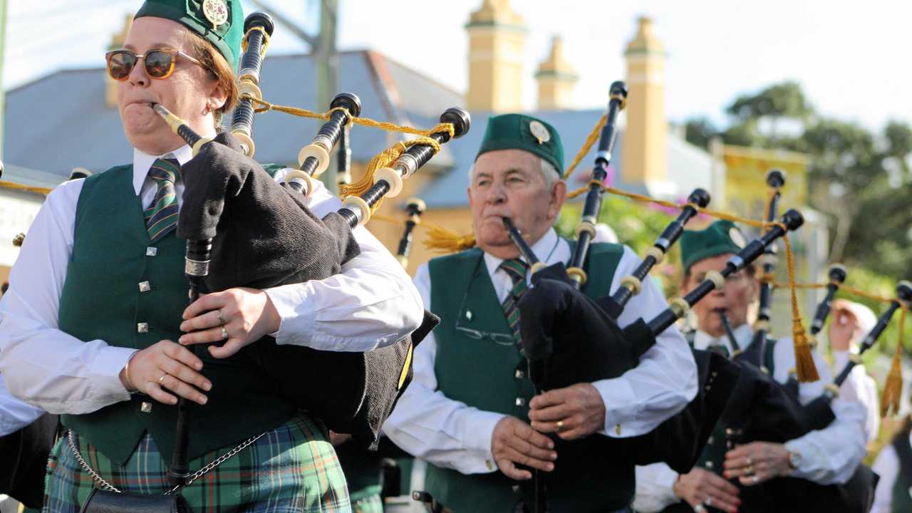 SWEET SOUNDS: River Street, Maclean fills with the sound of pipes and drums. Picture: Jenna Thompson