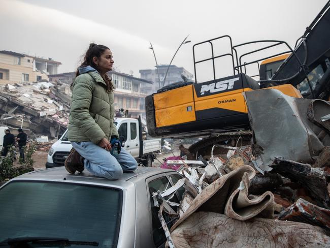 A woman waits for news of her loved ones, believed to be trapped under collapsed building in Hatay, Turkey. Picture: Getty Images