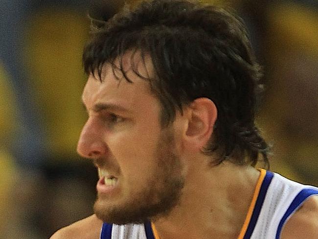 OAKLAND, CA - APRIL 28: Andrew Bogut #12 of the Golden State Warriors celebrates against the Denver Nuggets during Game Four of the Western Conference Quarterfinals of the 2013 NBA Playoffs at ORACLE Arena on April 28, 2013 in Oakland, California. NOTE TO USER: User expressly acknowledges and agrees that, by downloading and or using this photograph, User is consenting to the terms and conditions of the Getty Images License Agreement. (Photo by Jed Jacobsohn/Getty Images)