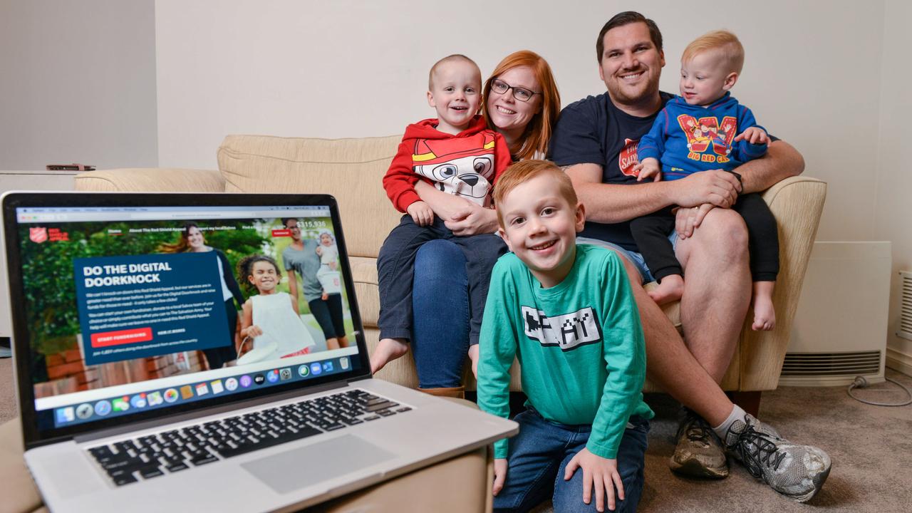 Online fundraising has become more popular since the Covid-19 pandemic. Here parents Nathan and Kylie Hodges and children Caleb, Jackson and Judah check out the Salvation Army Digital Door Knock Red Shield Appeal in 2020. Picture: Brenton Edwards