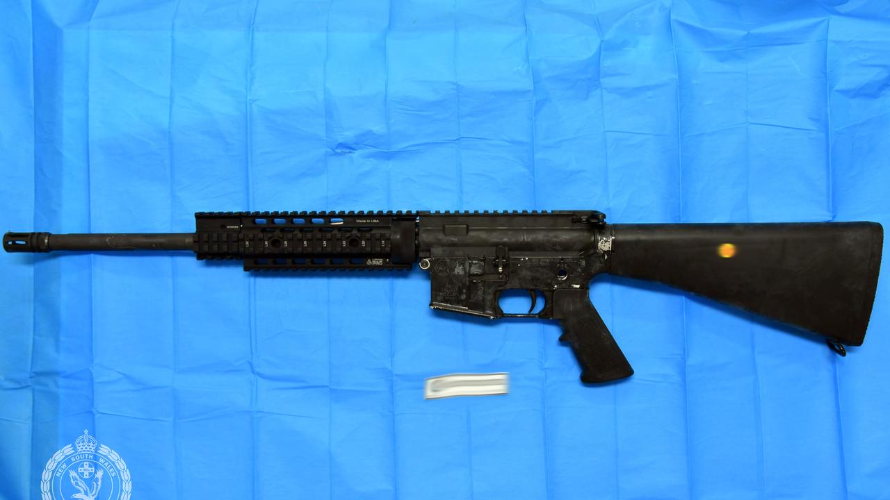 The loaded military-style AR15 rifle was allegedly found in a car during an attempted vehicle stop.