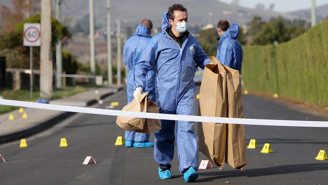 Police investigators at the crime scene at Ford Rd, Brighton. Picture: SAM ROSEWARNE.