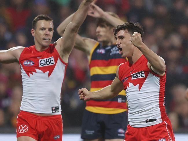 Sam Wicks (right) celebrates a goal in the Swans’ important win against Adelaide. Picture: Sarah Reed/AFL Photos via Getty Images