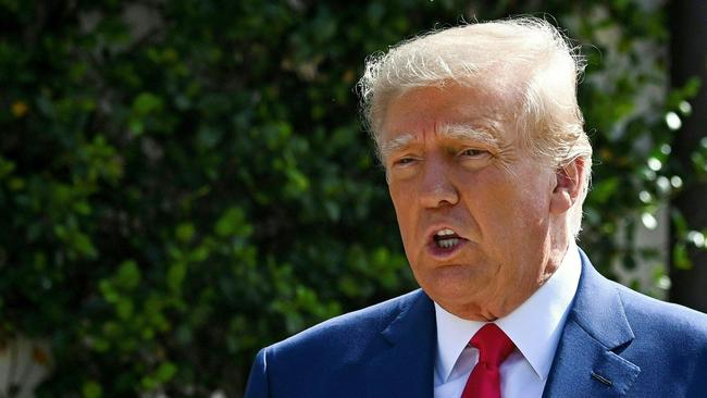 Donald Trump departs a Palm Beach polling station after voting in the mid-term elections last November. Picture: AFP