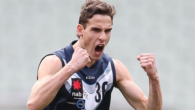 Vic Metro’s Ben King celebrates a late goal. Pic: Michael Klein