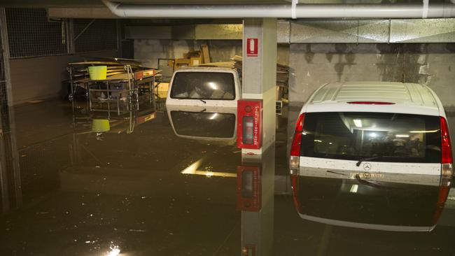 A carpark which was flooded this morning due to wild weather that hit Byron Bay. Picture: Natalie Grono