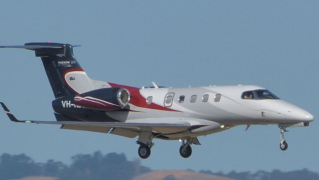 The Embraer EMB-505 Phenom 300 belonging to Nev Power.