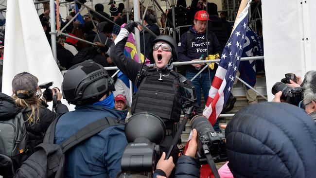 A man calls on people to raid the US Capitol in Washington on January 6 last year. Picture: AFP