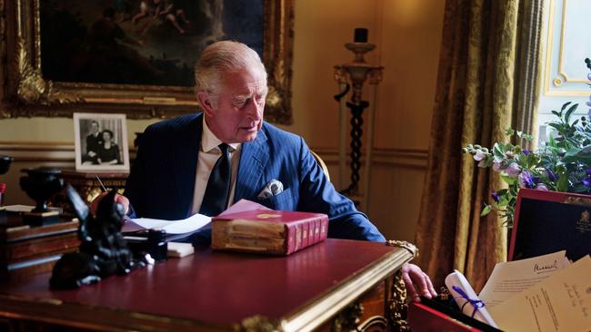 King Charles III carries out official government duties from his red box in the Eighteenth Century Room at Buckingham Palace, London. Picture: Getty