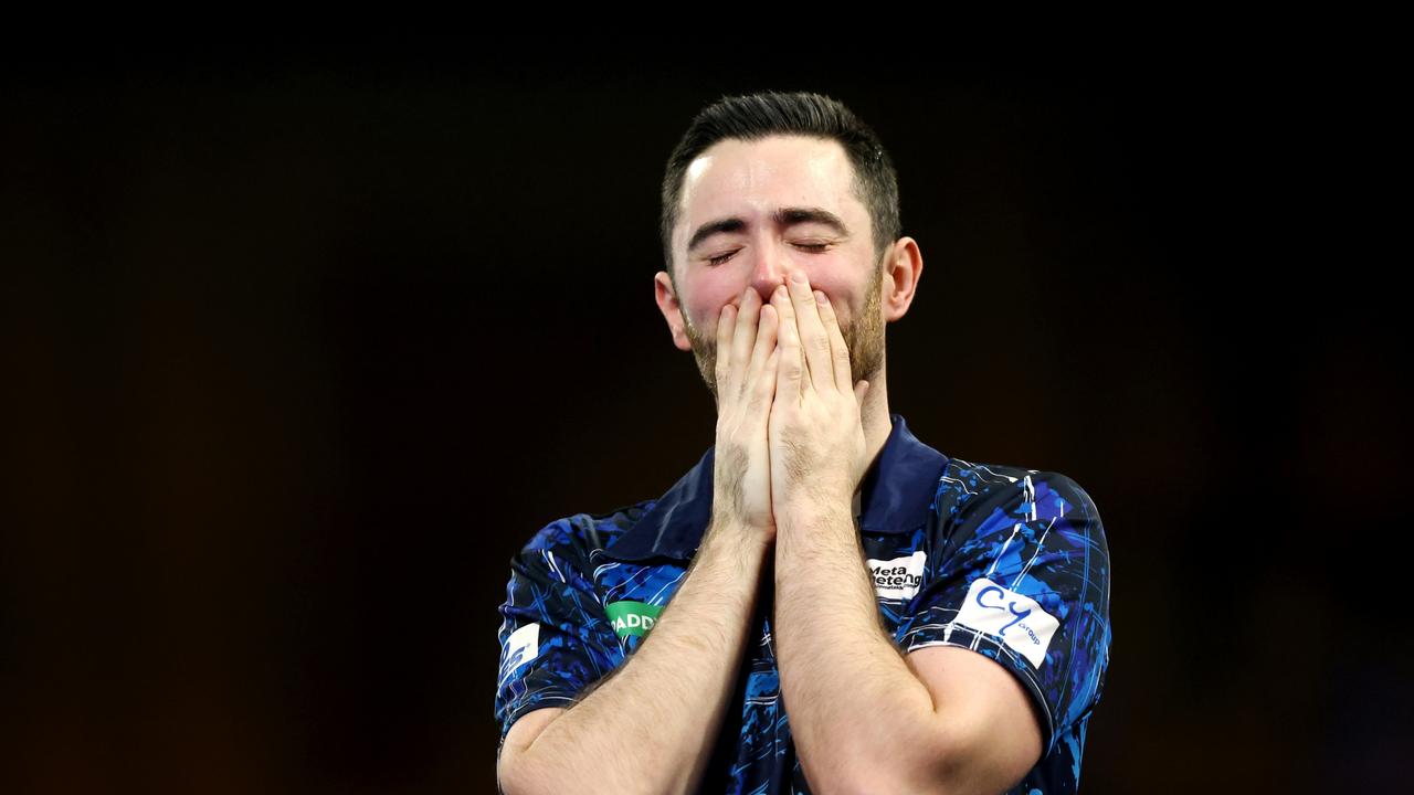 Luke Humphries of England reacts after winning. Photo by Tom Dulat/Getty Images.