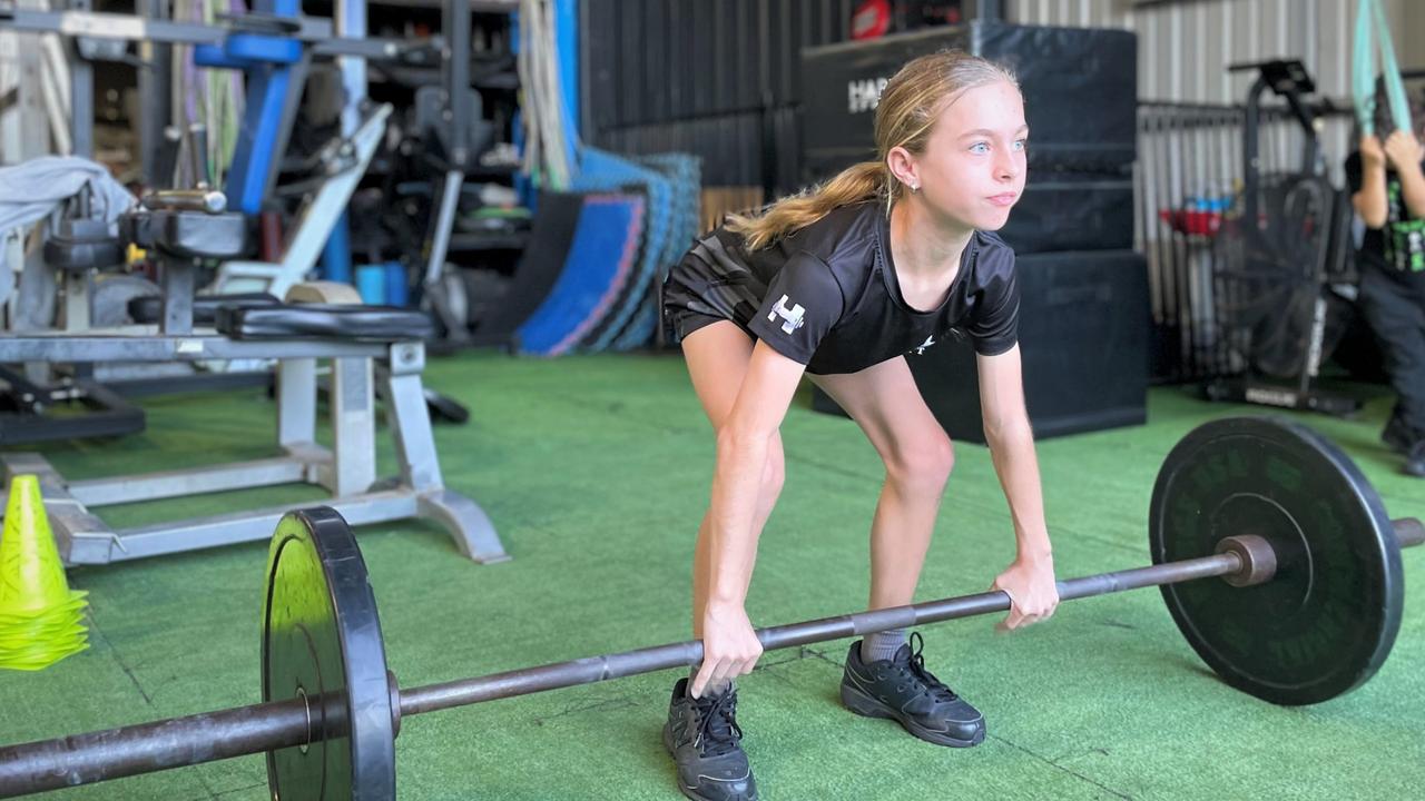 Ozarks teenage girl setting world powerlifting records