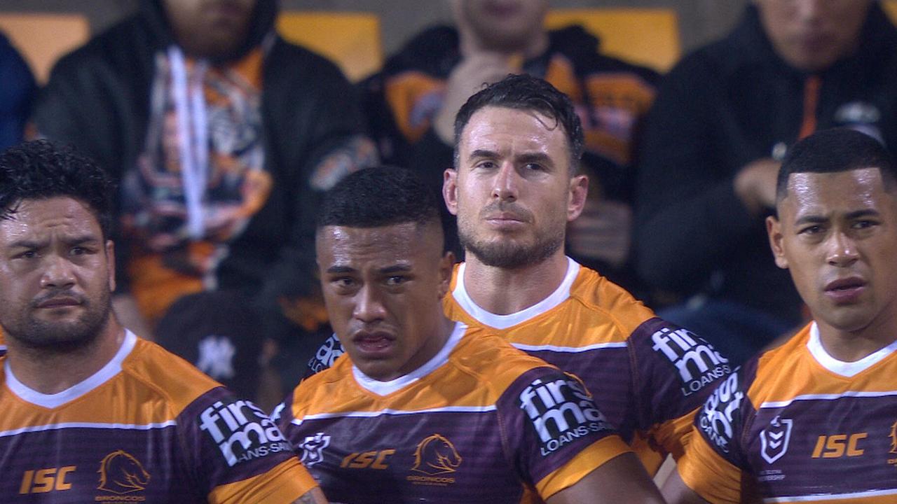 Broncos players look on after Leilua's try