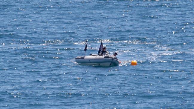 A boat inspecting shark nets (AAP/Image Steve Pohlner)