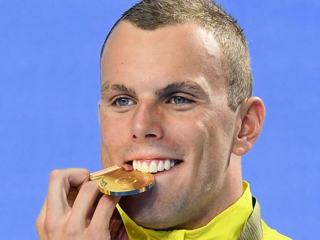 GOLD COAST, AUSTRALIA - APRIL 06:  Gold medalist Kyle Chalmers of Australia poses during the medal ceremony for the Men's 200m Freestyle Final on day two of the Gold Coast 2018 Commonwealth Games at Optus Aquatic Centre on April 6, 2018 on the Gold Coast, Australia.  (Photo by Quinn Rooney/Getty Images)