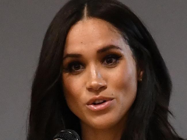 (FILES) In this file photo taken on March 06, 2020 Britain's Meghan, Duchess of Sussex speaks during a school assembly as part of a visit to Robert Clack School in Essex, on March 6, 2020, in support of International Womenâs Day. - Meghan Markle has revealed she suffered a miscarriage in July this year, writing in the New York Times on November 25, 2020 of the deep grief and loss she endured with her husband Prince Harry. (Photo by BEN STANSALL / POOL / AFP) / == STRICTLY EMBARGOED == NO USE AND NO PUBICATION ON ANY PLATFORM UNTIL 22:30 GMT MARCH 7, 2020 ==