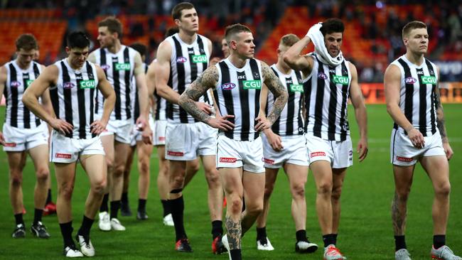 Dejected Pies leave the Giants Stadium pitch. Picture: Getty Images