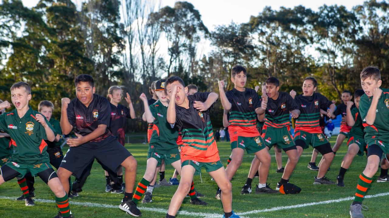 Students perform a haka at TG Millner Sportsground in Eastwood, NSW. Saturday 13th July 2019. The club held a “Back to Eastwood Day” with players from the 1969 and 1999 teams present. (AAP IMAGE/Jordan Shields)