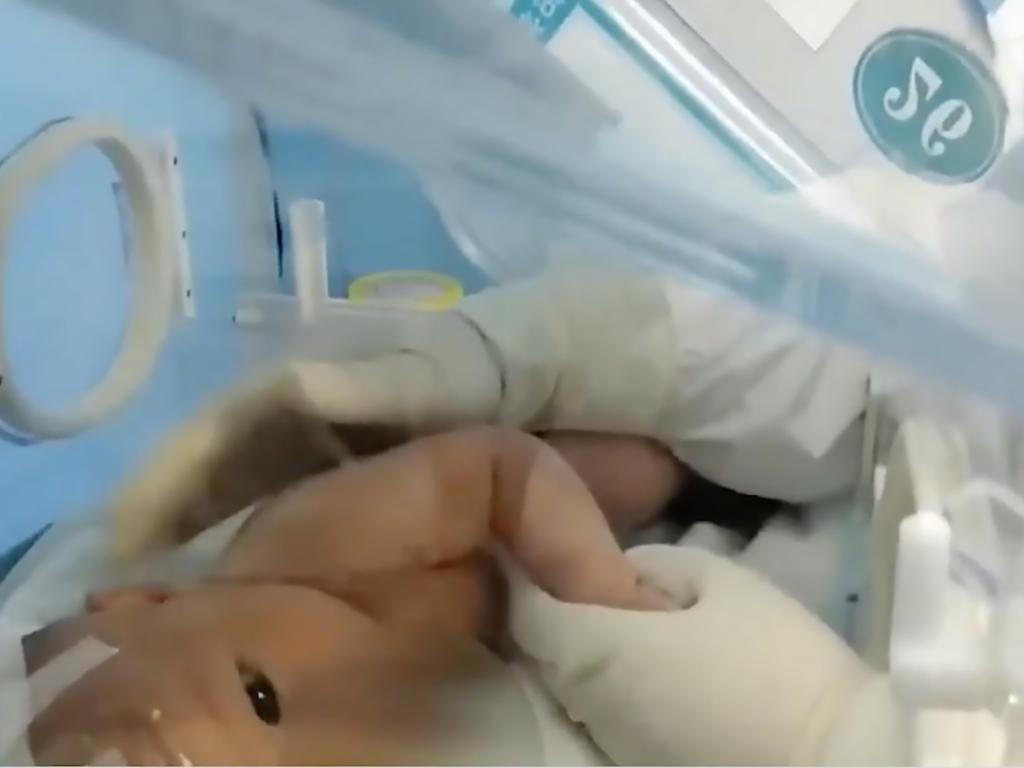 Immediately after birth, the newborn girl was isolated at Wuhan Children's Hospital. Picture: Wuhan Children's Hospital/Asiawire/australscope