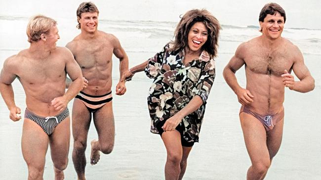 Tina Turner with players (L-R) Allan Langer, Andrew Ettingshausen and Wayne Pearce during filming of the 'Simply the Best' advertising campaign in 1990. Picture: Peter Muhlbock.