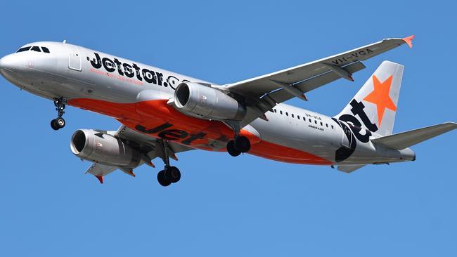 A Jetstar Airbus A320 commercial passenger jet plane comes into land at the Cairns International Airport, increasing tourism numbers in Far North Queensland. Picture: Brendan Radke