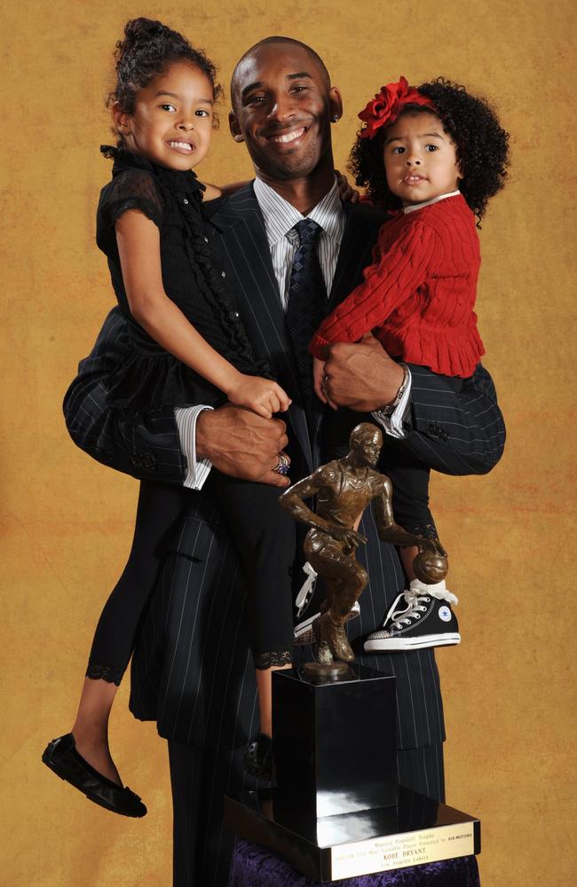 Kobe Bryant #24 of the Los Angeles Lakers poses for a portrait with his daughters Natalia and Gianna at the 2007-08 NBA Most Valuable Player Award press conference presented by Kia Motors at the Sheraton Gateway Hotel on April 29, 2008 in Los Angeles California. Picture: Getty