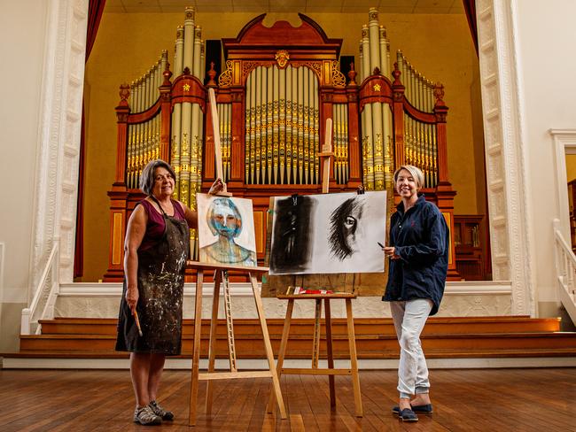 Vicki Rochau and Renee de Saxe with some of their work in progress at the Barossa Regional Gallery, which also houses the Hill &amp; Son grand organ. Picture: Matt Turner