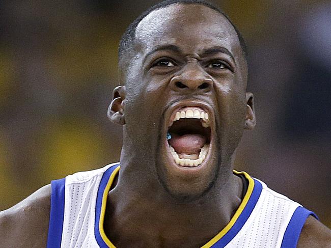 Golden State Warriors forward Draymond Green (23) celebrates after making a three point basket in front of Memphis Grizzlies forward Zach Randolph (50) during the first half of Game 1 in a second-round NBA playoff basketball series in Oakland, Calif., Sunday, May 3, 2015. (AP Photo/Marcio Jose Sanchez)