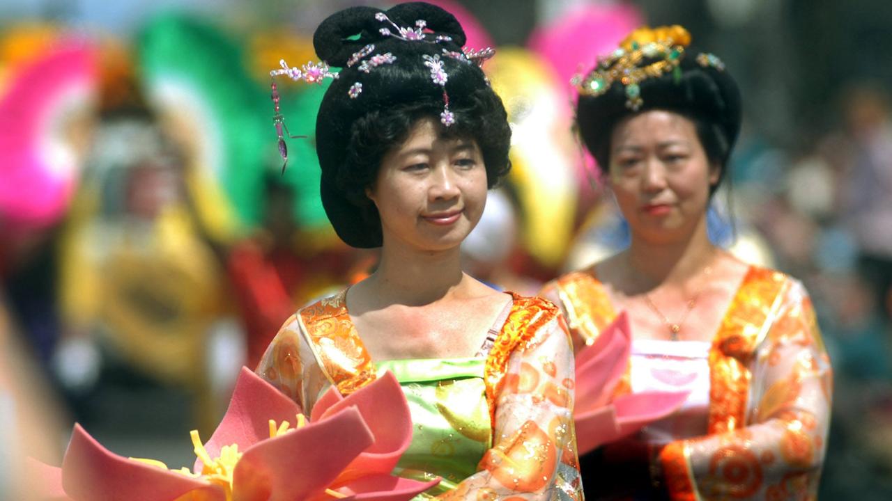 Japanese ladies dressed in their traditional costume with a touch of the floral at Toowoomba Carnival of Flowers – Street Parade took place through the city after in was cancelled last year due to strong winds. Picture: David Martinelli.