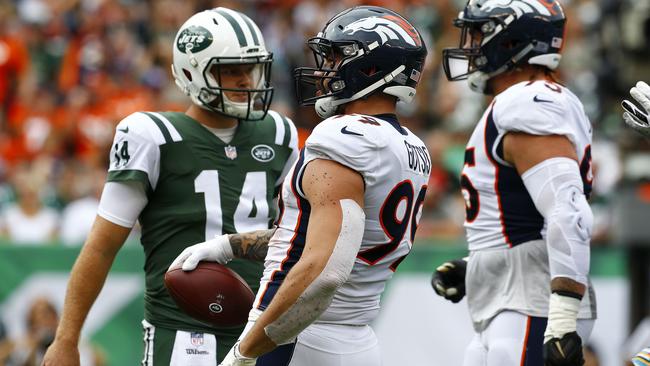 Adam Gotsis celebrates after causing Sam Darnold to fumble.