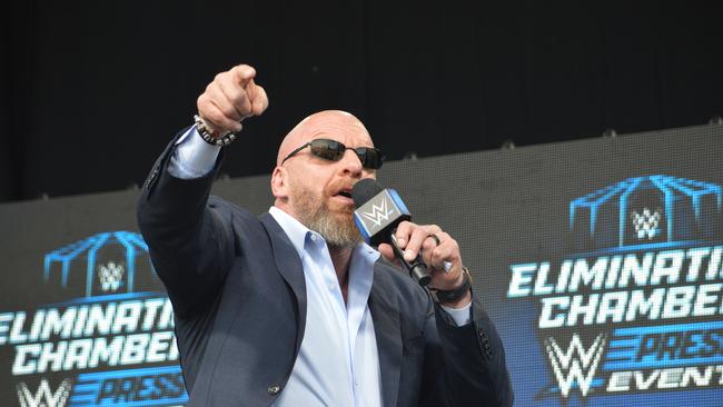 Triple H treated fans and broke up a fight, all in a days work for WWE. Picture: Sam Gironda