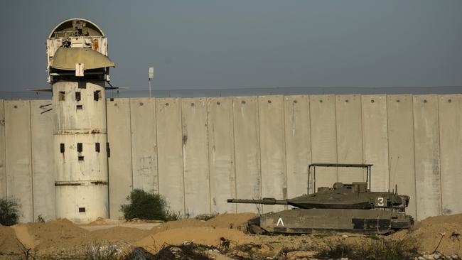 An Israeli tank moves near the Erez Crossing, at the border with Israel in the Gaza side, last week. Picture: Getty Images