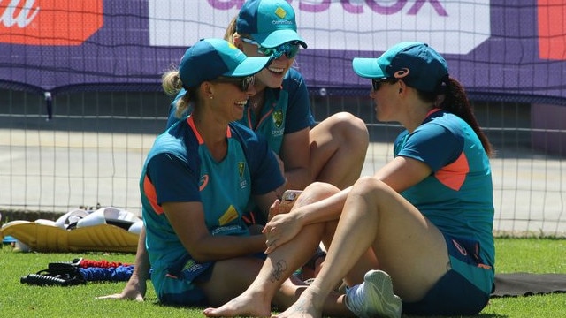 Australian players Ash Gardner, Megan Schutt and Kim Garth watch the WPL auction on a phone. Picture: Twitter