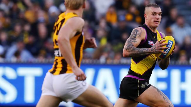 Dustin Martin leaves Hawk Will Langford in his wake in Round 20. Picture: Michael Klein