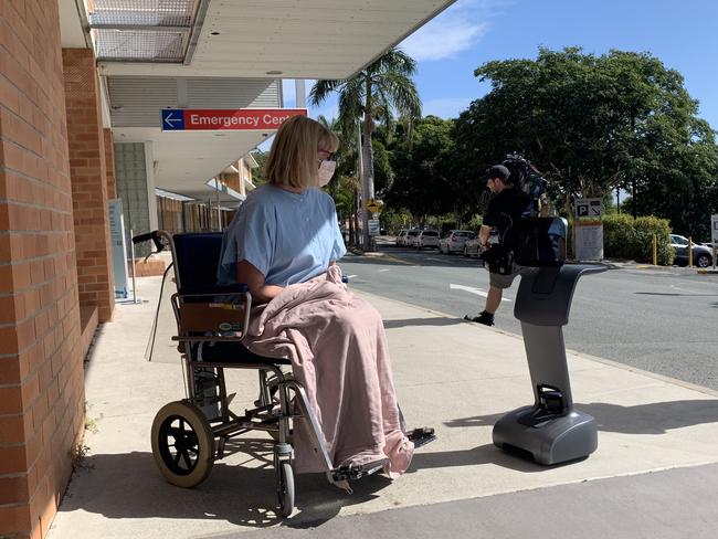 Medical robot, Temi, interacts with a patient outside Greenslopes Private Hospital Emergency Centre. Picture: Tobias Jurss-Lewis