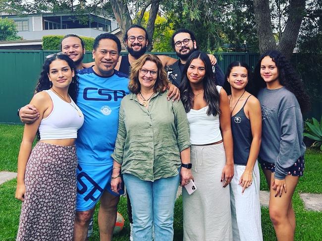 Laga’aia with his wife Sandie and seven of their eight kids.