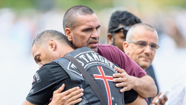 Former Australian professional boxer Anthony Mundine receives a hug from a member of the Tu Tangata Iwi Tapu motorcycle club. Picture: Kai Schwoerer/Getty Images