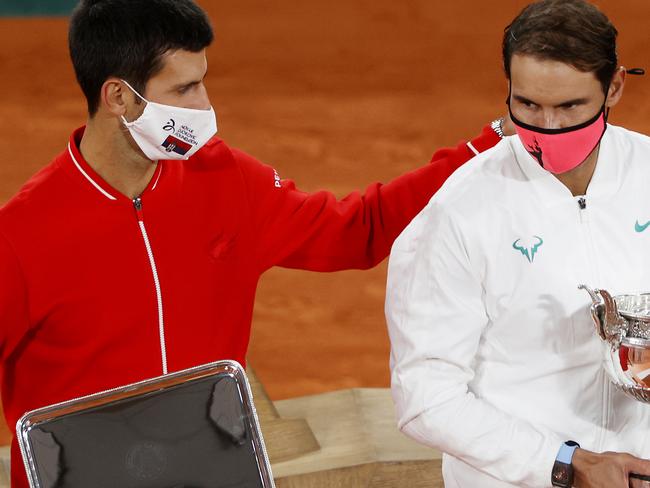 PARIS, FRANCE - OCTOBER 11: Runner-up Novak Djokovic of Serbia (L) and winner Rafael Nadal of Spain pose with their respective trophies following their Men's Singles Final on day fifteen of the 2020 French Open at Roland Garros on October 11, 2020 in Paris, France. (Photo by Clive Brunskill/Getty Images)