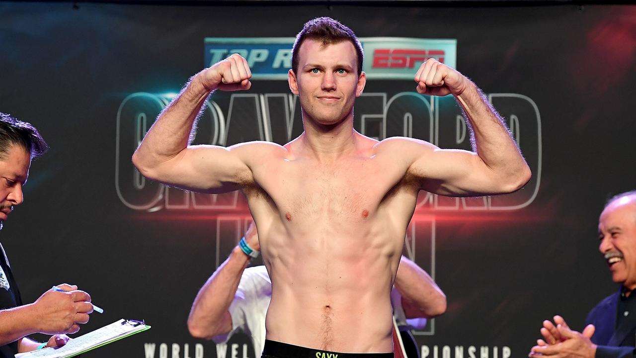 Jeff Horn poses as he makes weight on his second attempt. Picture: AFP