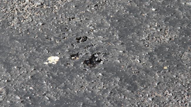 Holes in the bitumen on Hartley St, before the night works were completed. Picture: Gera Kazakov