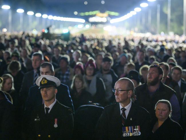 Thirty-five thousand people assembled in the pre-dawn dark to honour Australia’s veterans at the national Anzac Day service in Canberra. Picture: Getty Images