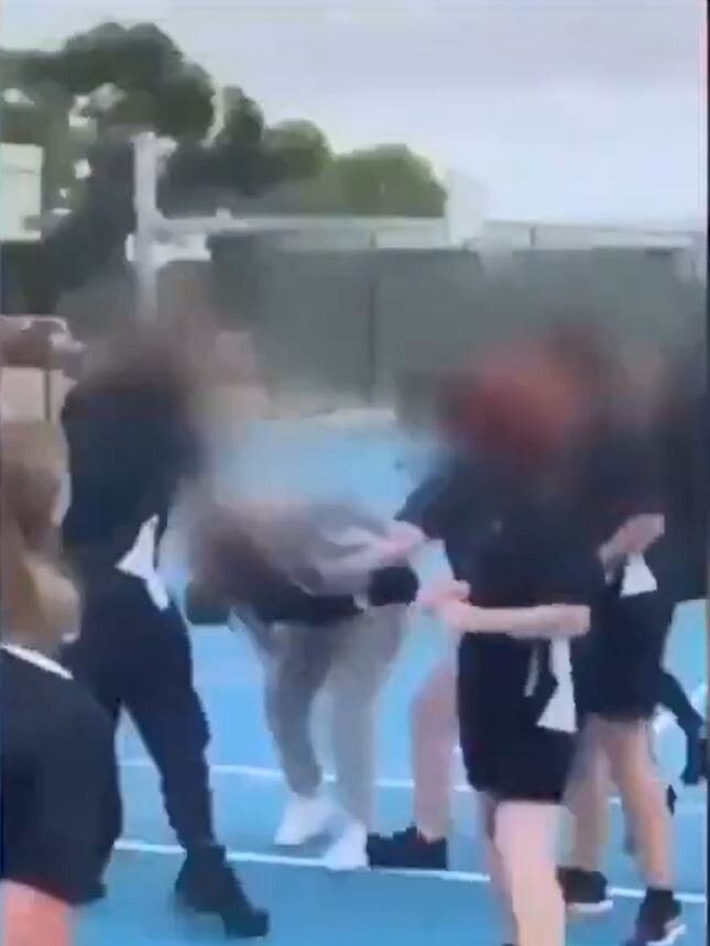 A screengrab of violence at Wirreanda Secondary School, which is being filmed and posted to social media. Picture: 7NEWS