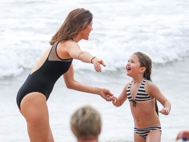 Princess Mary and daughter Josephine, 6, share a giggle. Princess Mary and her royal family hit Sydney’s Palm Beach for a dip before they head to Tasmania for an Aussie Christmas. Picture: Media Mode