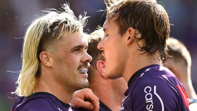 MELBOURNE, AUSTRALIA - MARCH 09:  Ryan Papenhuyzen of the Storm celebrates with team mates after scoring a try during the round one NRL match between the Melbourne Storm and the Parramatta Eels at AAMI Park on March 09, 2025, in Melbourne, Australia. (Photo by Quinn Rooney/Getty Images)