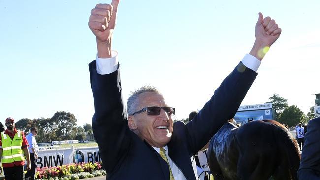 Greg Hall celebrates in the mounting yard after Fawkner's Caulfield Cup.win. Picture: Wayne Ludbey