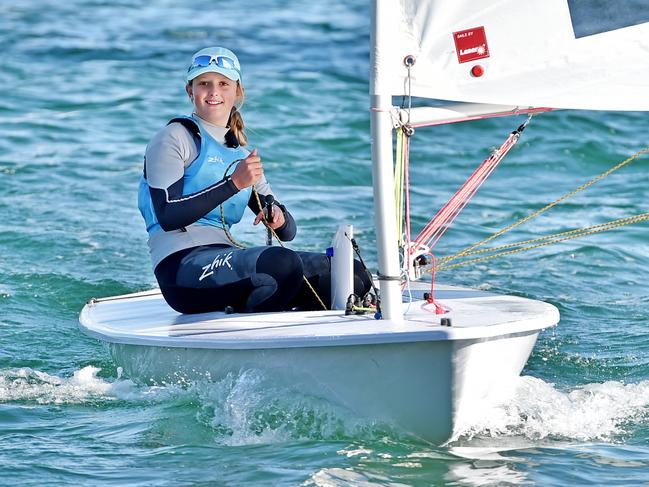 Champion sailor Evie Saunders, when she was 13, on her Laser sailboat just before representing Australia at the Youth World Titles at Canada in 2019. Picture: Troy Snook