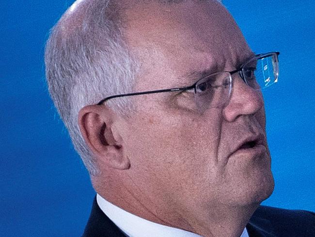 Australian Prime Minister Scott Morrison arrives for a meeting about the global supply chain, during the G20 Summit at the Roma Convention Center La Nuvola on October 31, 2021, in Rome, Italy. (Photo by Brendan Smialowski / AFP)