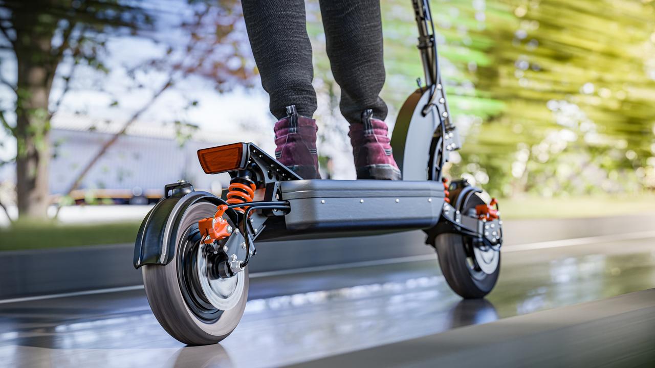 ‘Hooning’ teen does wheelie on electric scooter, overtakes cop car