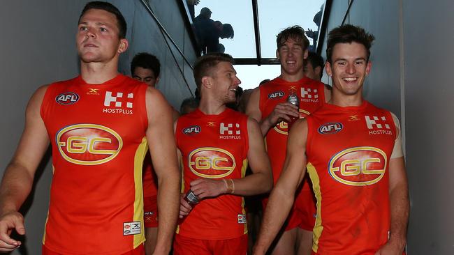 Steven May leads the Suns off the ground after win against Hawthorn. Picture: Michael Klein