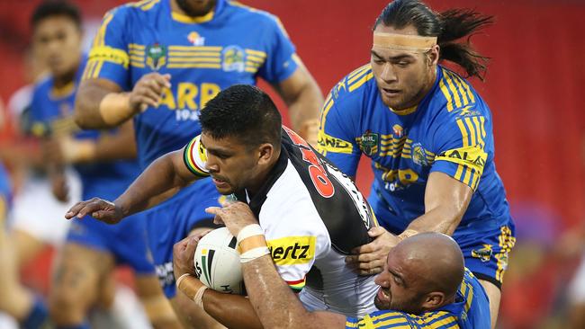 Tyrone Peachey of the Panthers is tackled during the NRL Trial match between the Penrith Panthers and Parramatta Eels at Pepper Stadium. Picture: Mark Metcalfe/Getty Images)